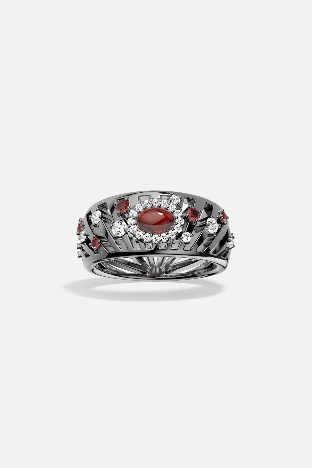 Bague APM, éclat rouge audacieux et finition rhodium, une allure résolument mystérieuse.