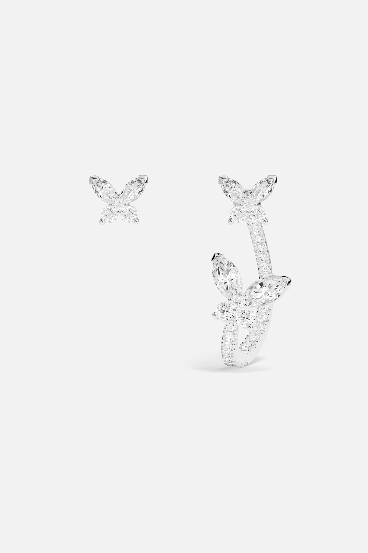 Boucles d'oreilles APM papillons, envolée scintillante et délicatement asymétrique.