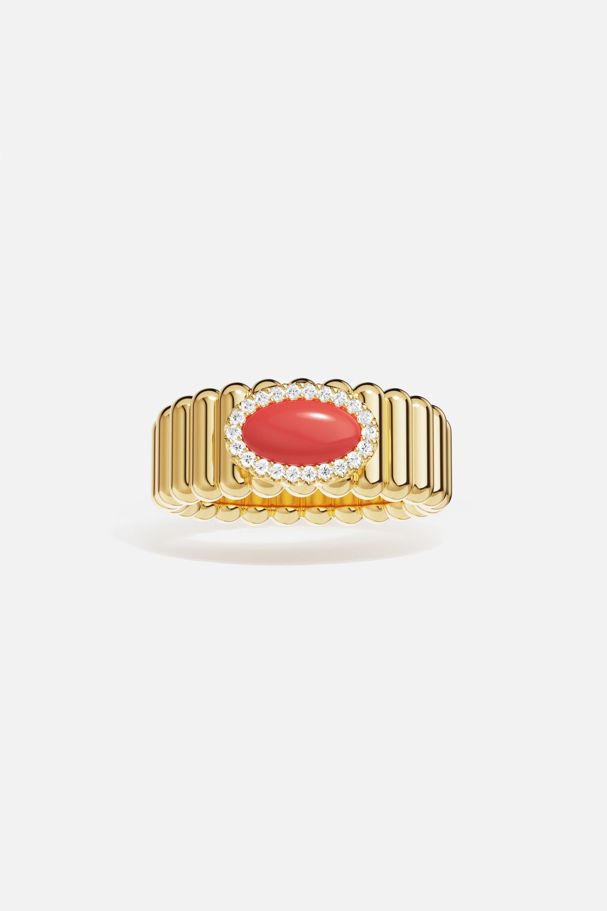Bague APM, éclat corail sur nervures dorées, une élégance solaire et sophistiquée.