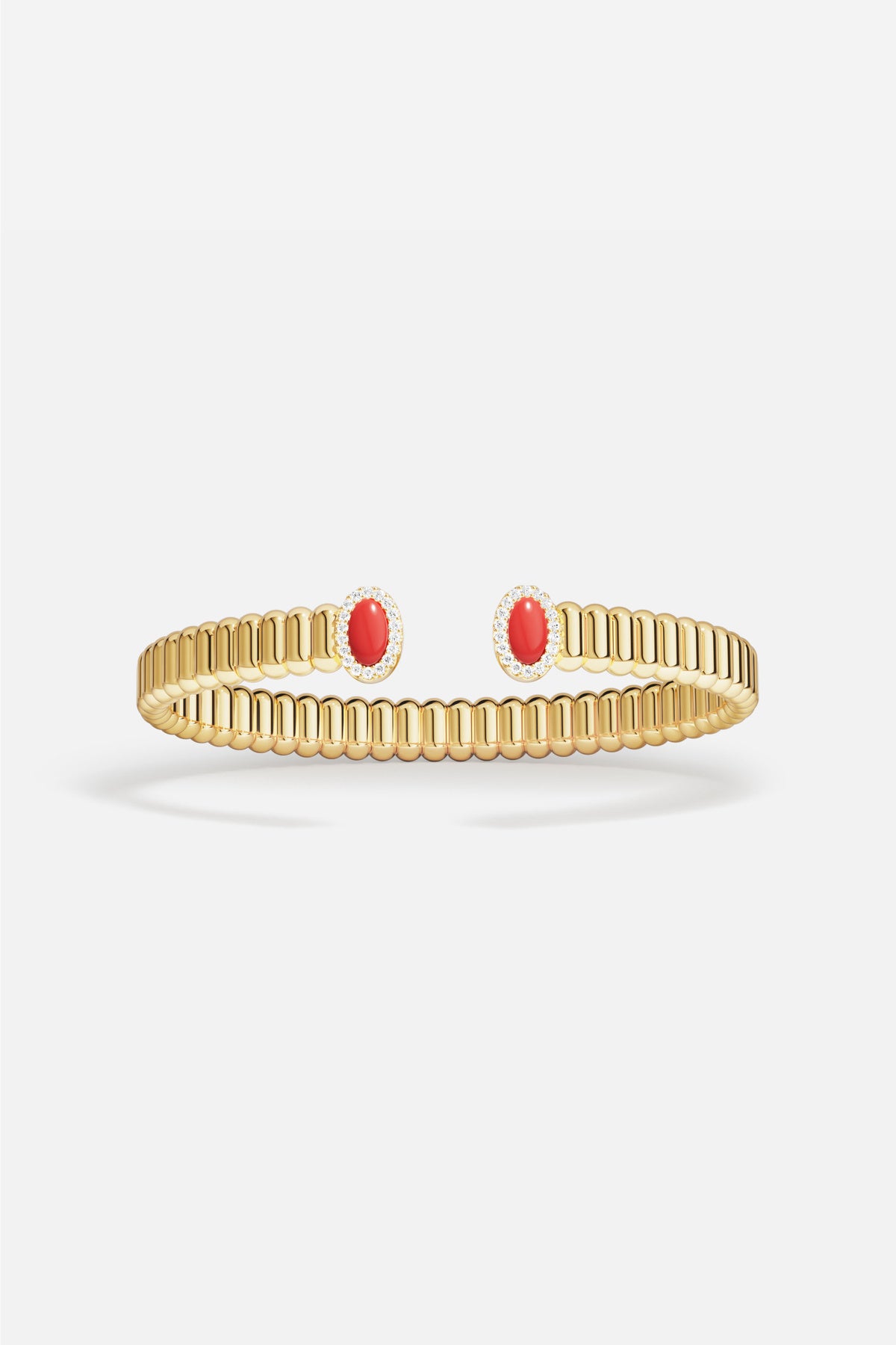 Bracelet APM aux touches rouges éclatantes, une élégance dorée pleine de caractère.
