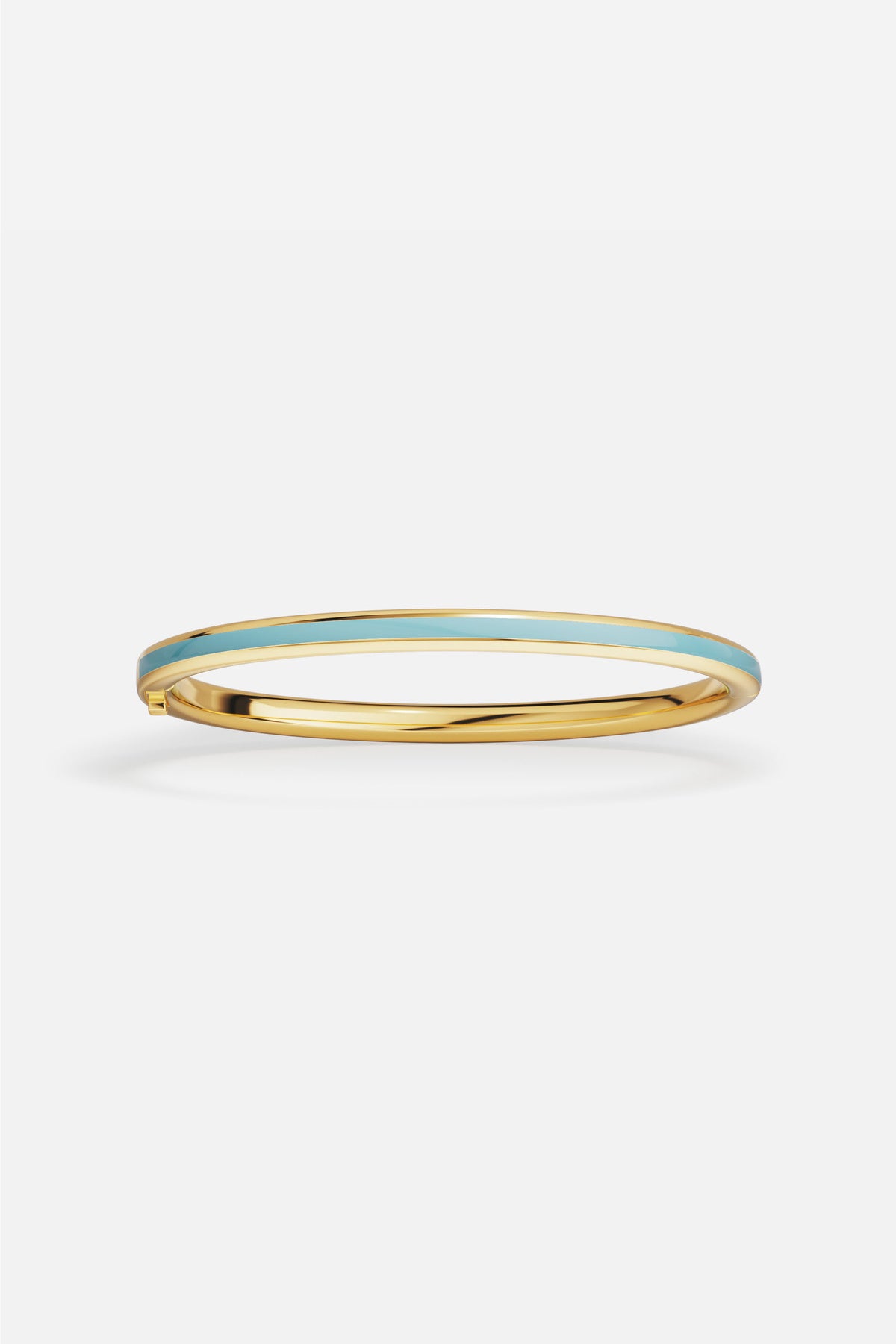 Bracelet jonc APM, ligne dorée rehaussée d'un bleu turquoise, douceur estivale.