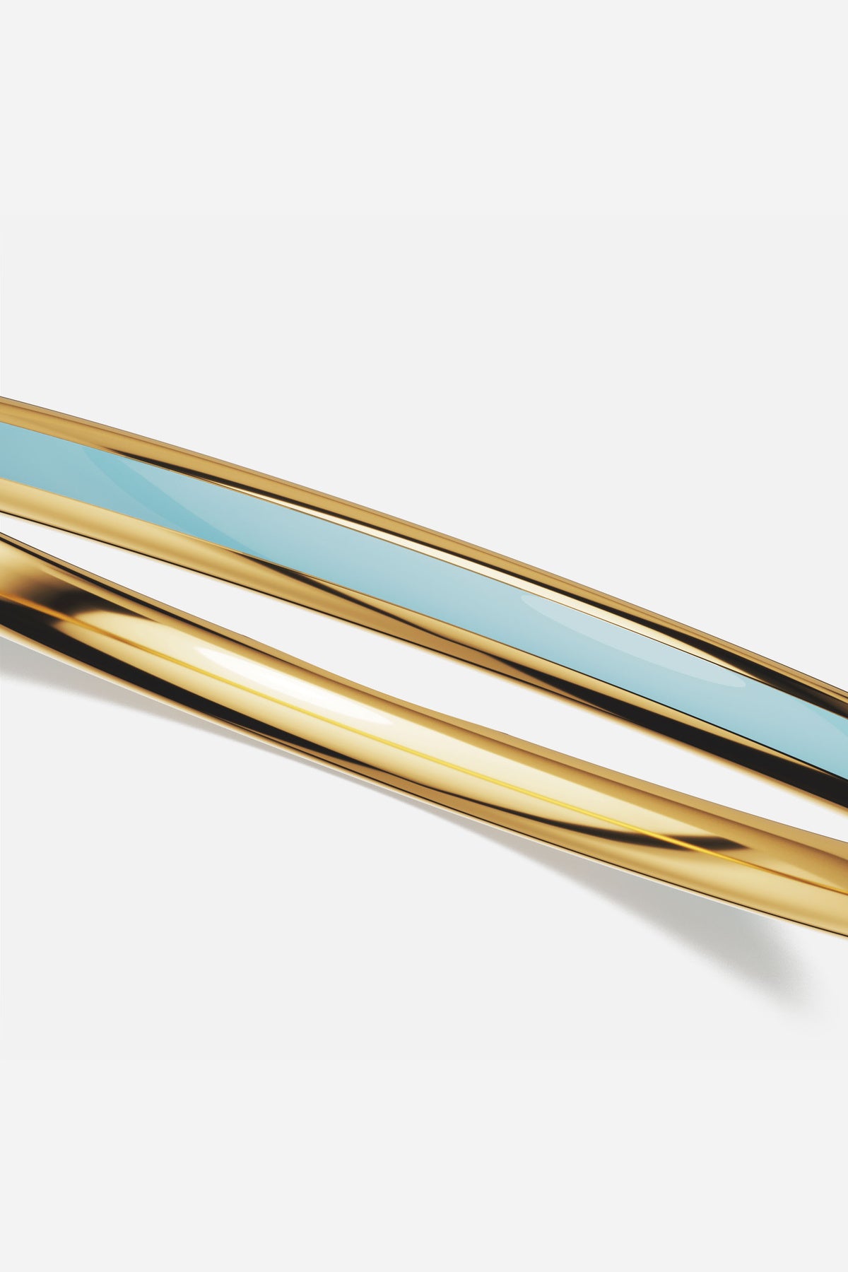Bracelet APM, duo doré et bleu ciel, une élégance fluide et lumineuse.