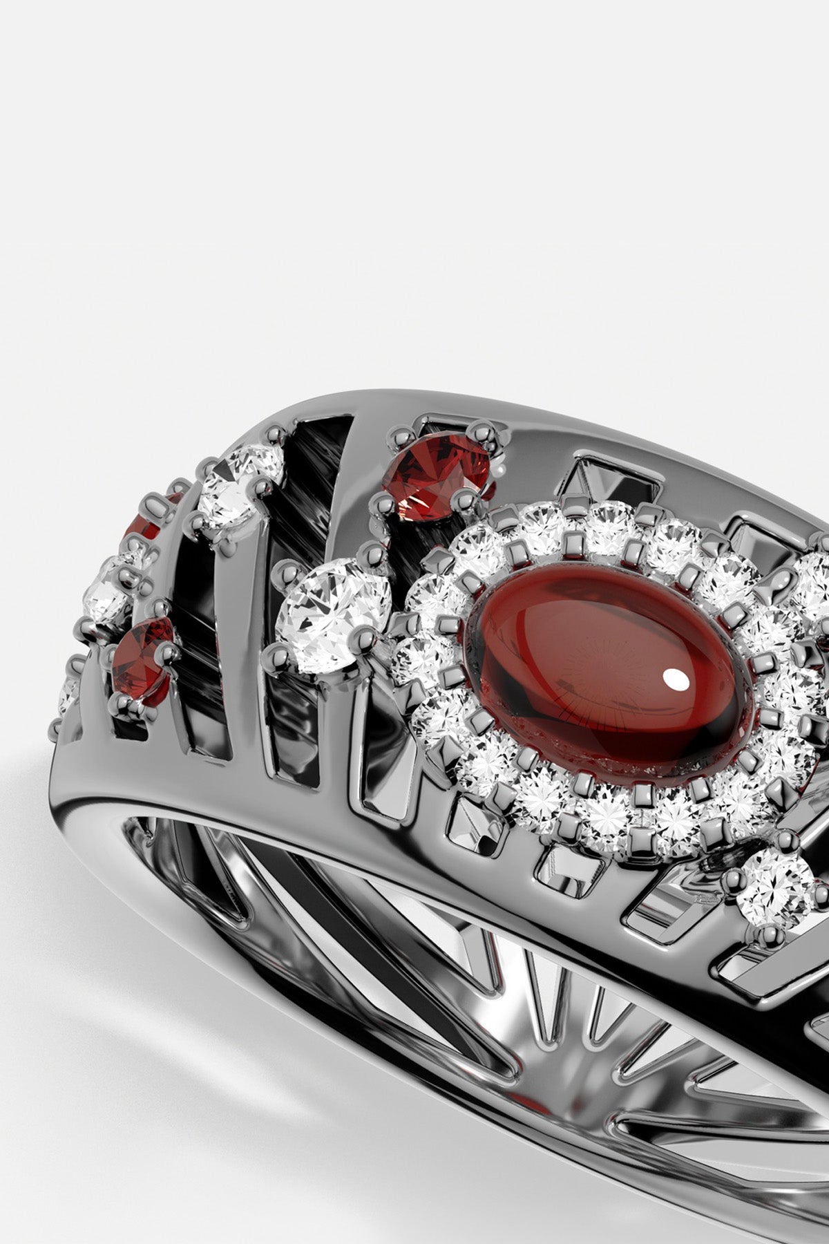 Bague APM, cabochon rouge profond et éclats scintillants, une élégance audacieuse et intemporelle.
