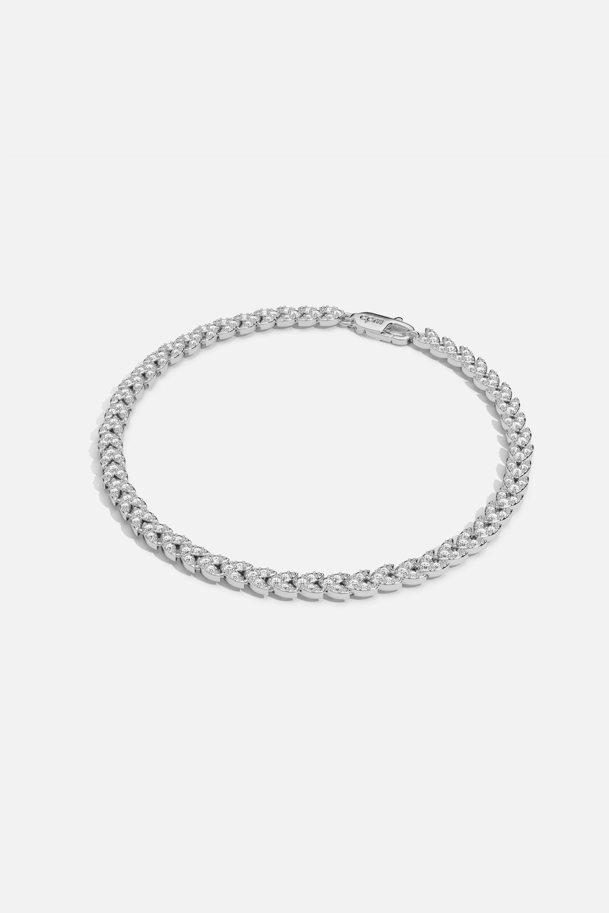 Bracelet APM en maille gourmette pavée, éclat contemporain au poignet.