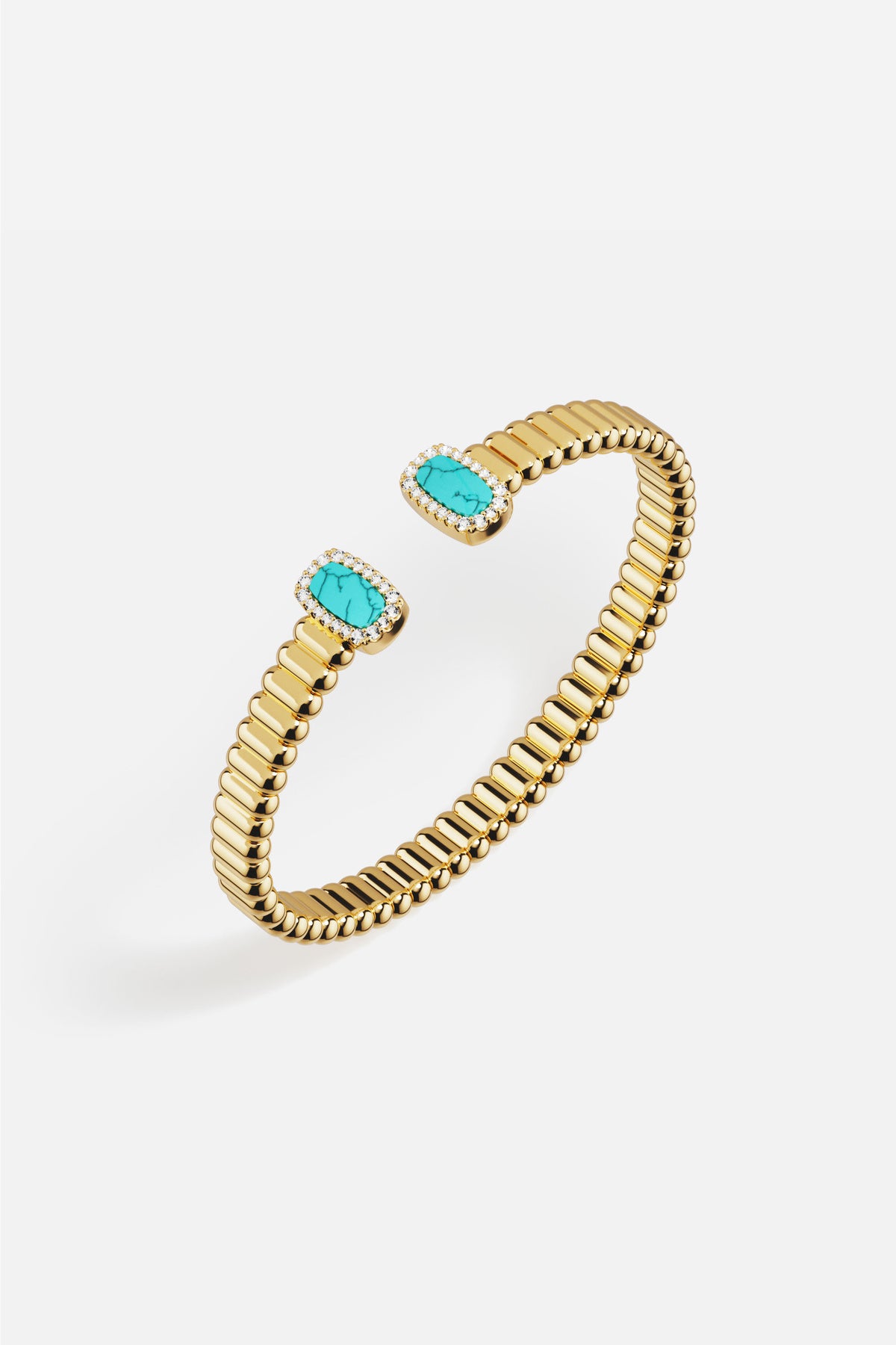 Bracelet APM aux teintes dorées et turquoise, une élégance solaire et intemporelle.