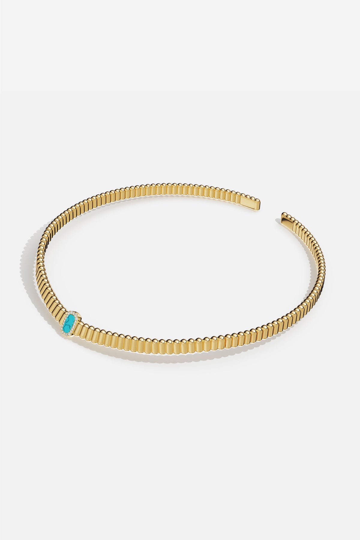 Collier APM couleur or, éclat turquoise pour une allure solaire et raffinée.