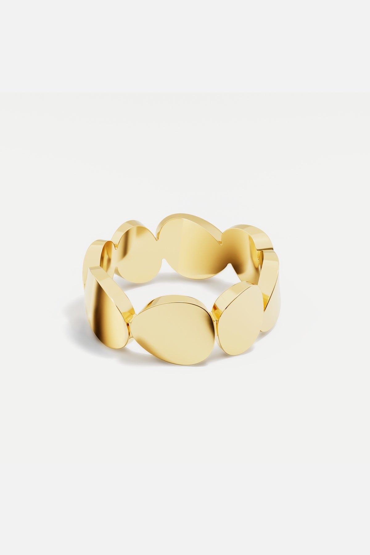 Bague APM aux courbes fluides, une allure dorée résolument moderne.