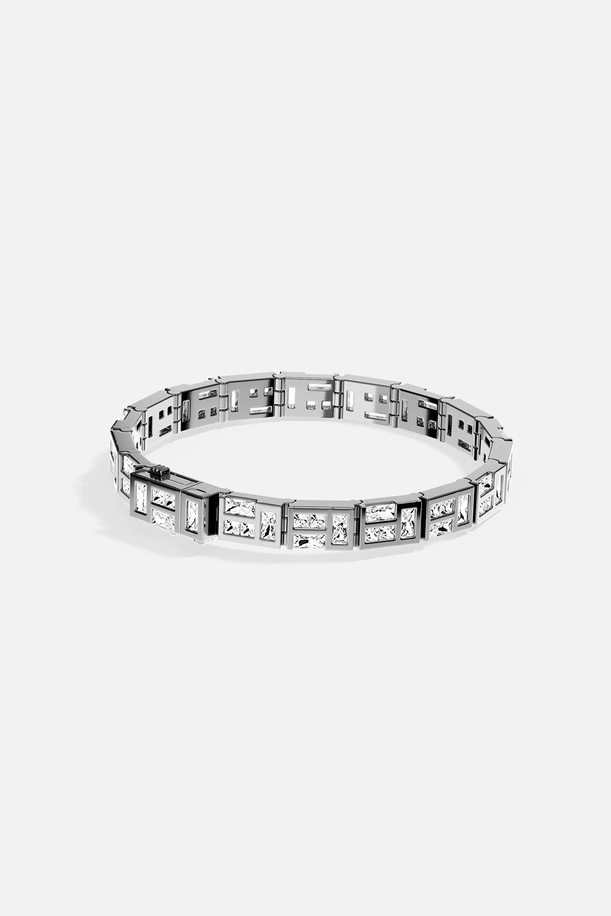 APM MONACO silver labyrinth bracelet with white stones on a white background