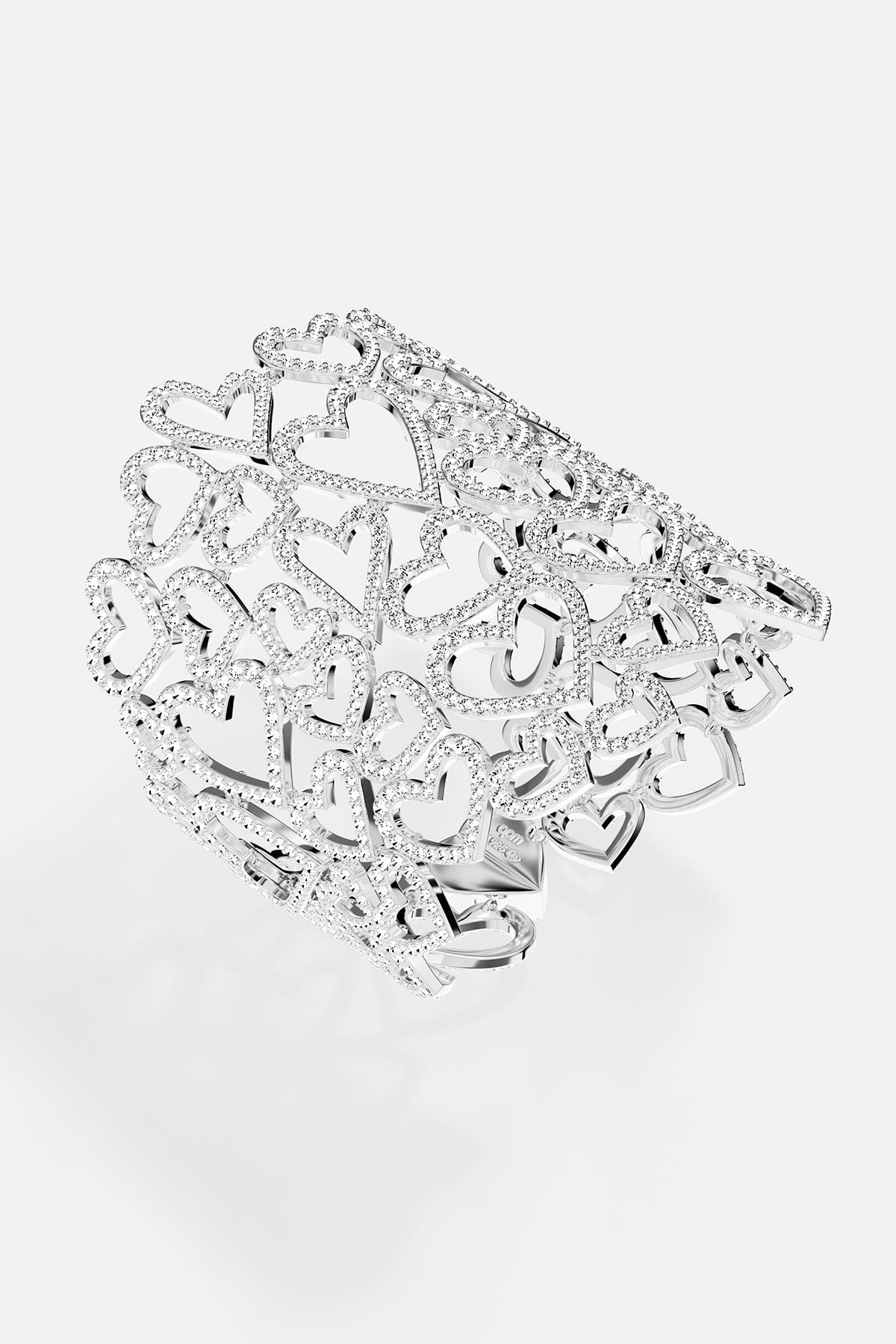 APM MONACO statement bracelet in silver with heart-shaped designs on a white background