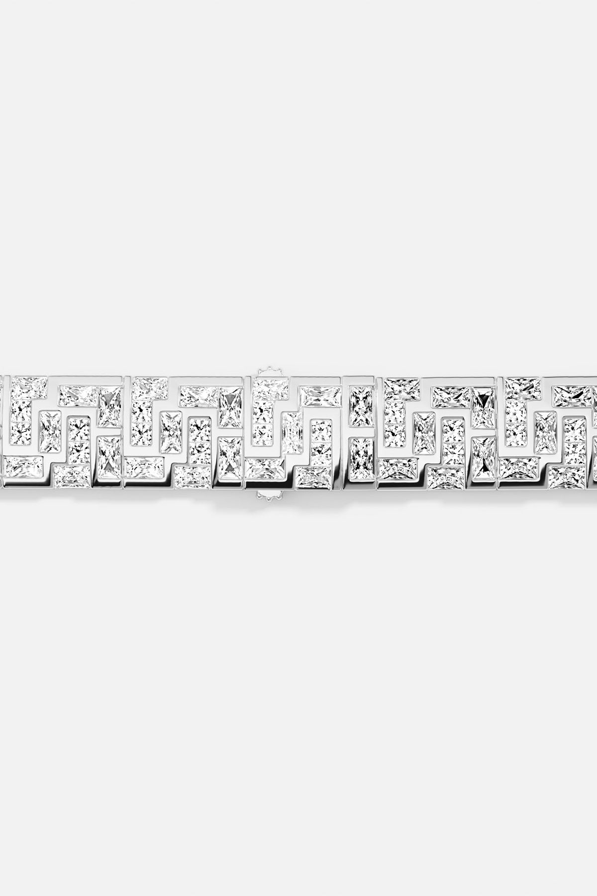 Close-up of APM MONACO labyrinth necklace in silver on a white background