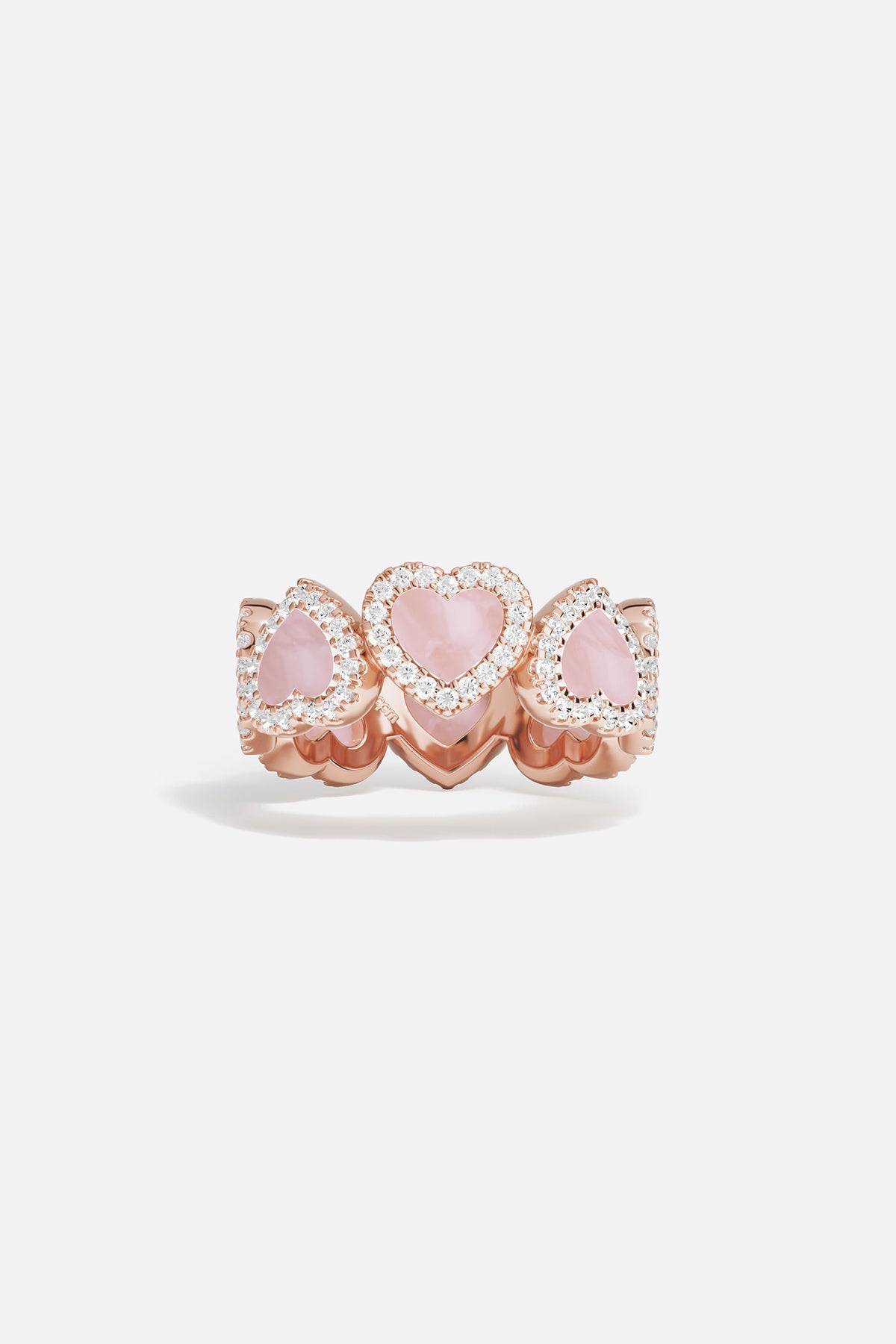 Rings APM Monaco: rose gold pavé ring with pink nacre hearts encircling the band, set with white cubic zirconia