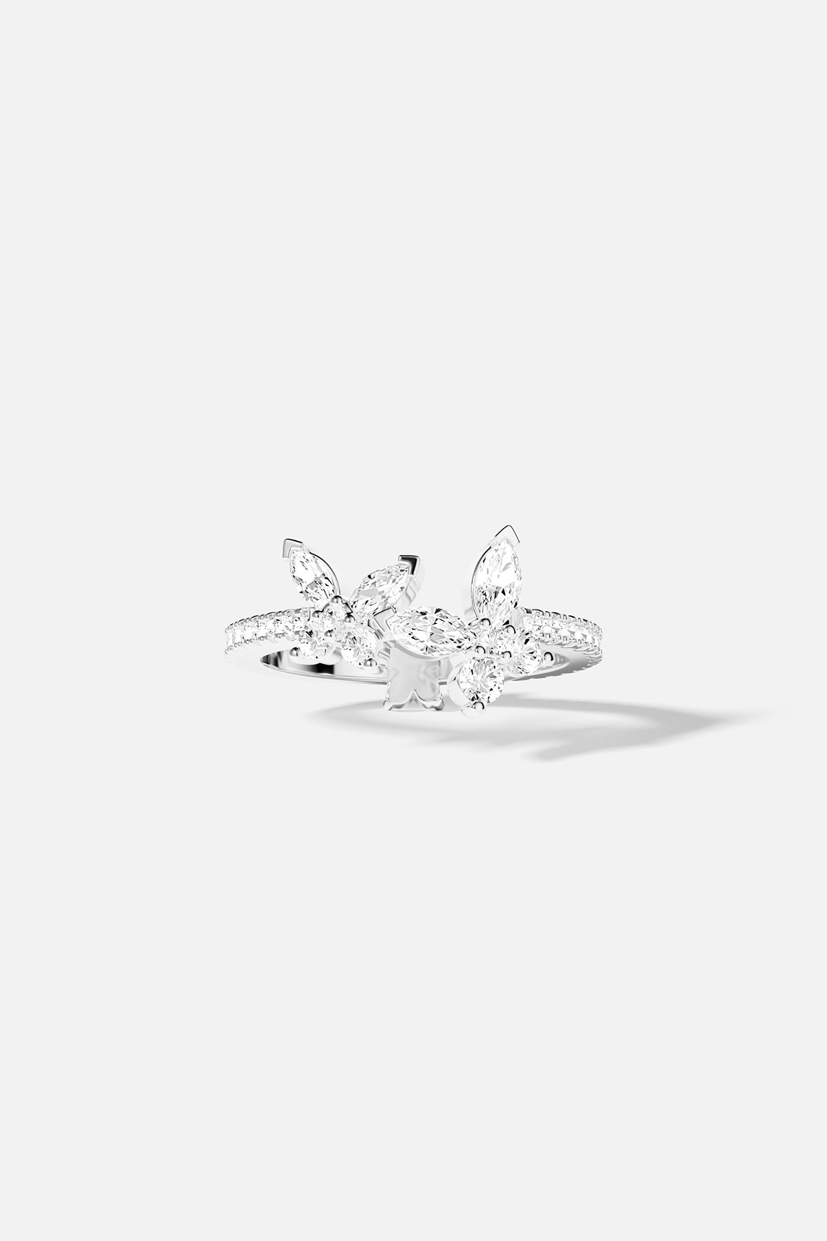 APM Monaco silver ring with white pavé stones, butterfly design.