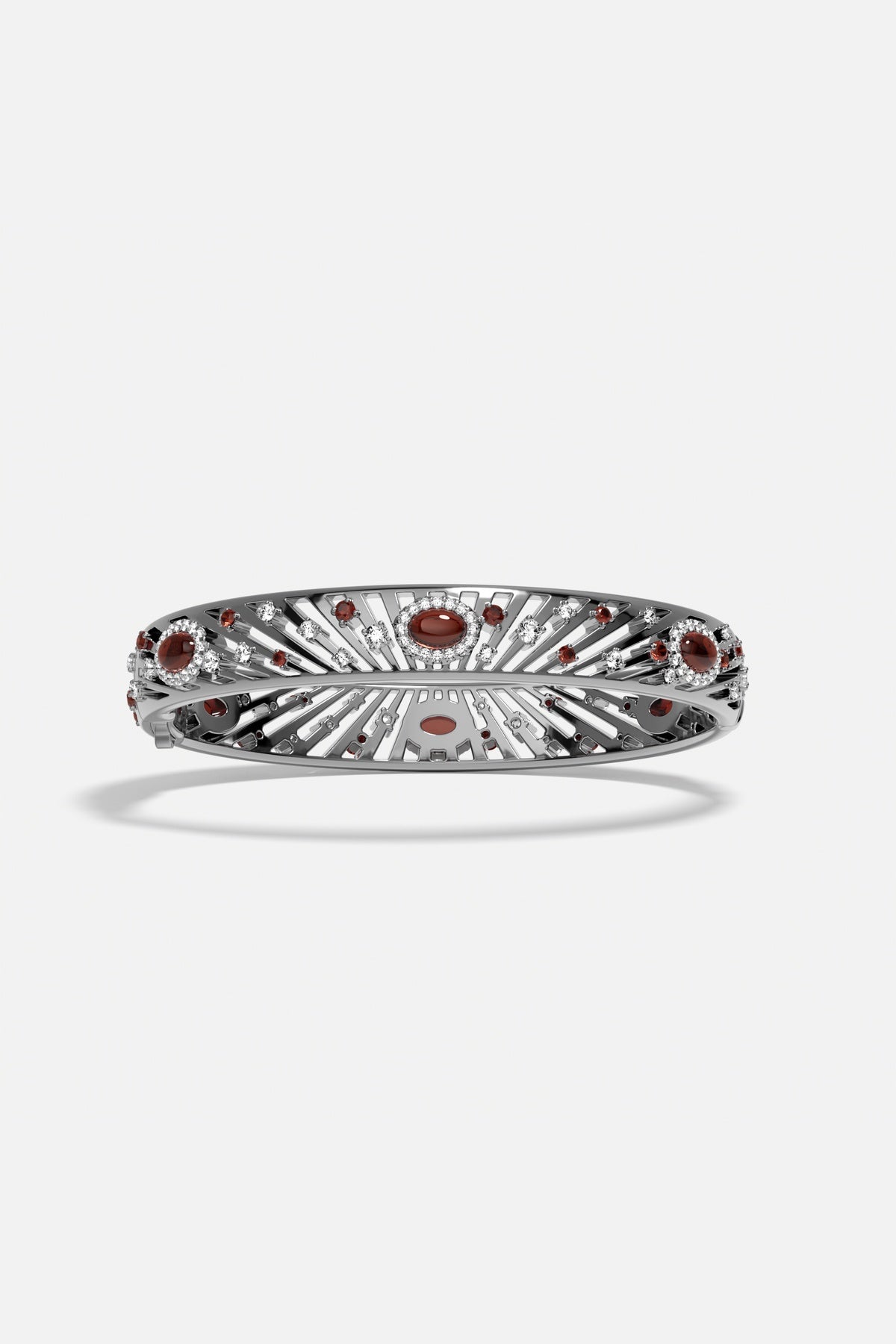 Bracelet APM, éclats rouges et finition rhodium, une élégance rayonnante et intemporelle.