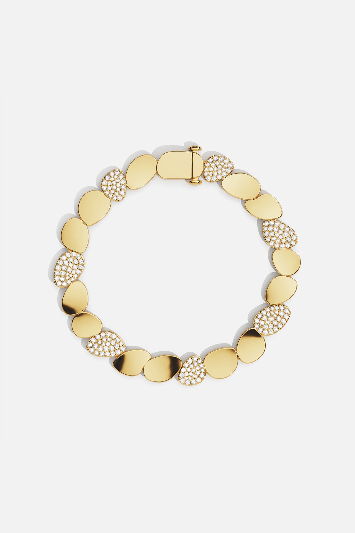 Bracelet APM, galets dorés et éclats scintillants, une élégance douce et lumineuse.