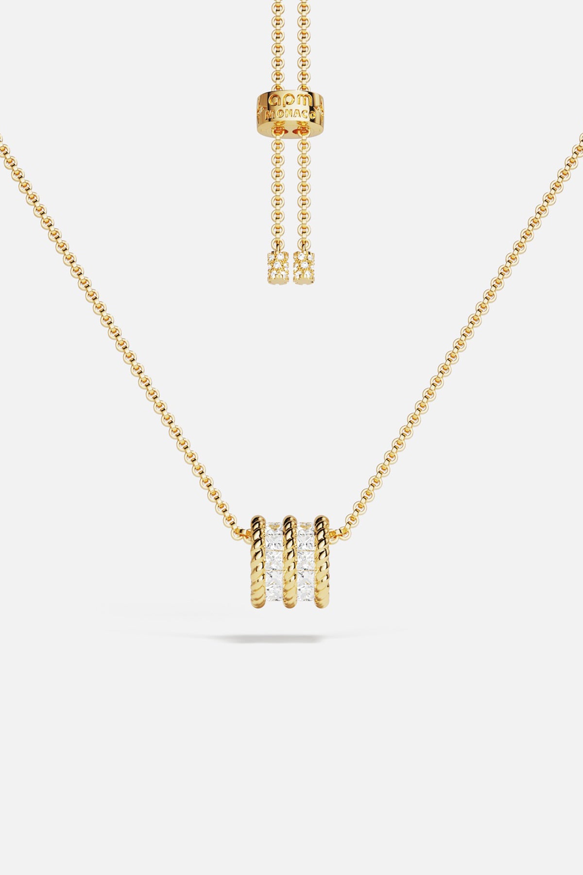 Collier APM Monaco doré, pendentif torsadé scintillant, élégance ajustable au quotidien.