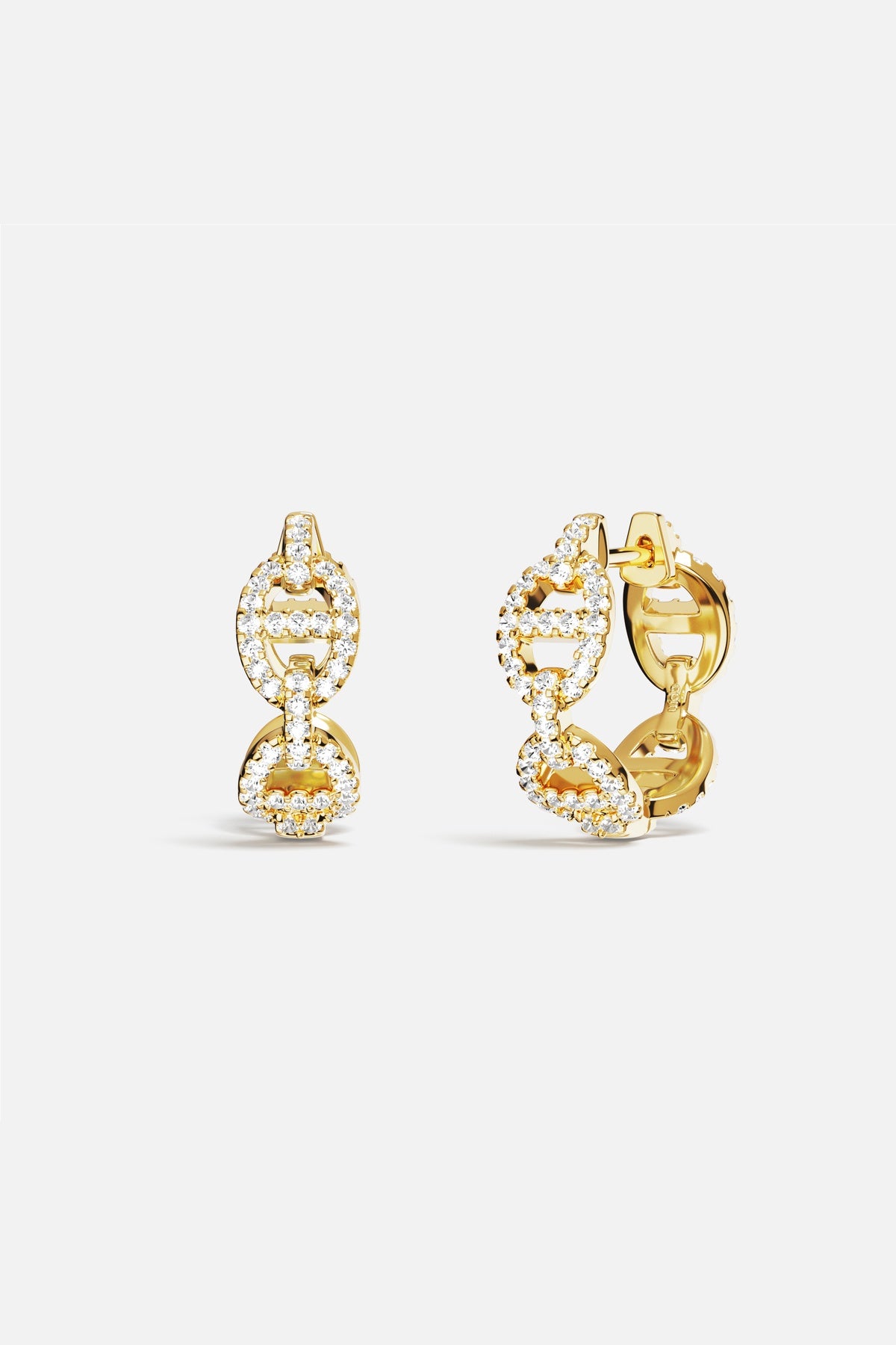 Boucles d'oreilles Morse APM Monaco, éclat doré et allure contemporaine.