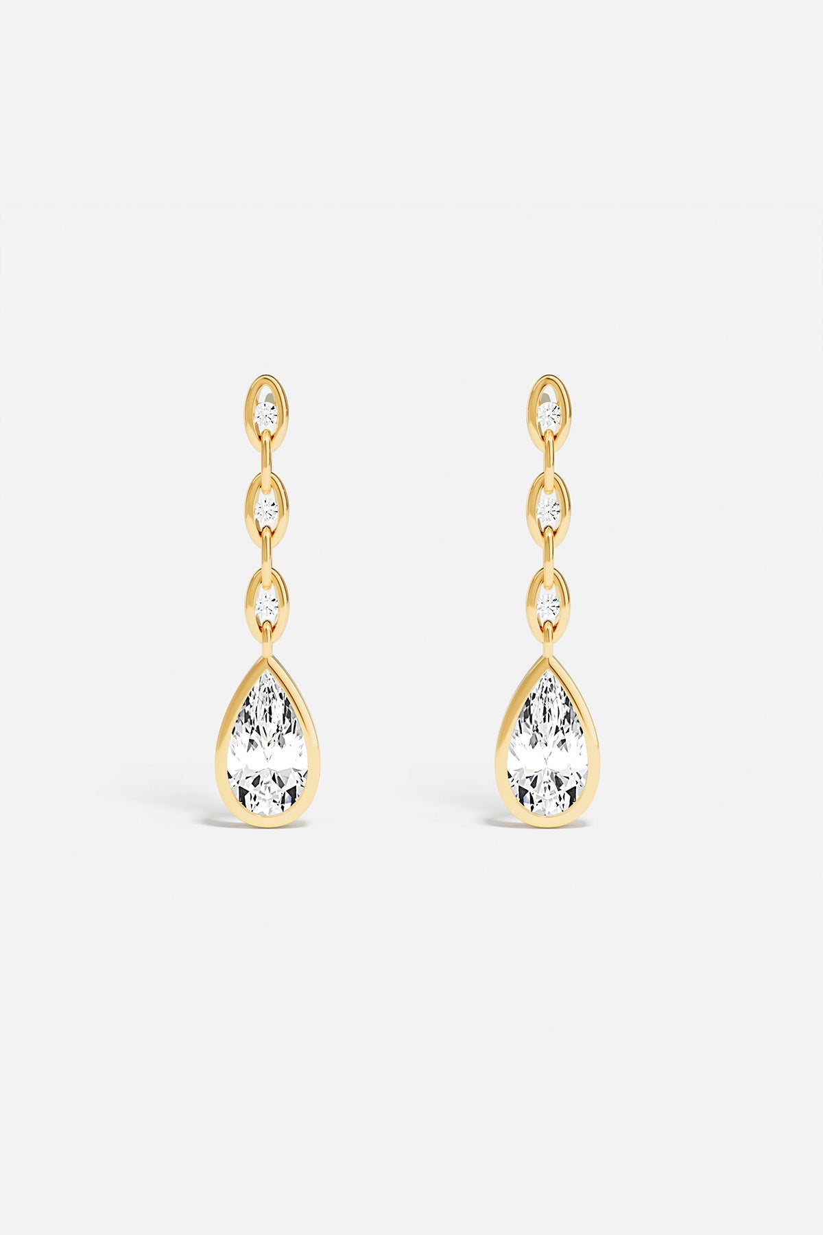 Boucles d'oreilles APM, une cascade lumineuse aux gouttes scintillantes, élégance intemporelle.