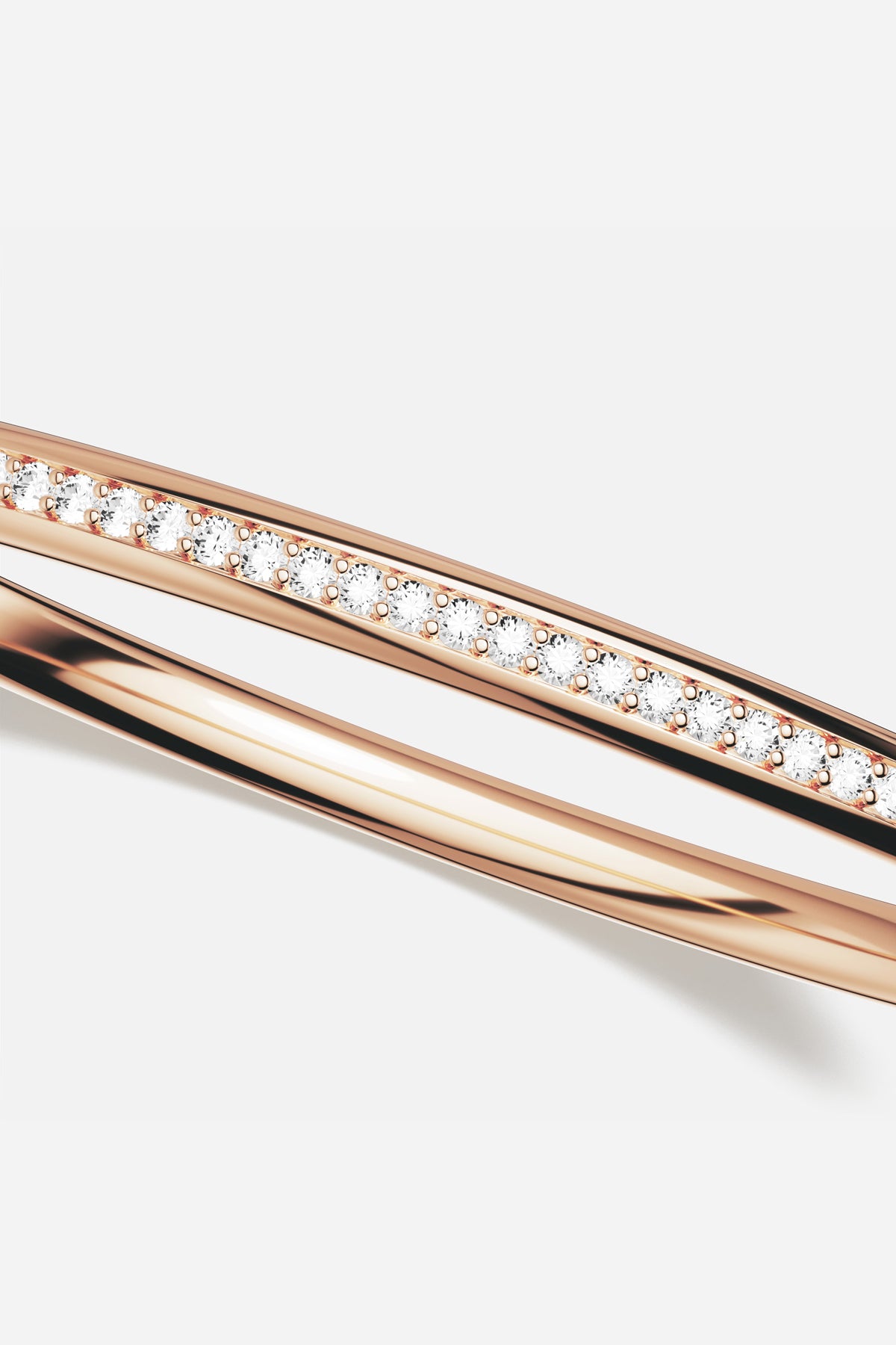Le Bracelet APM en alliage APM Monaco rosé, une ligne scintillante d'une élégance intemporelle.