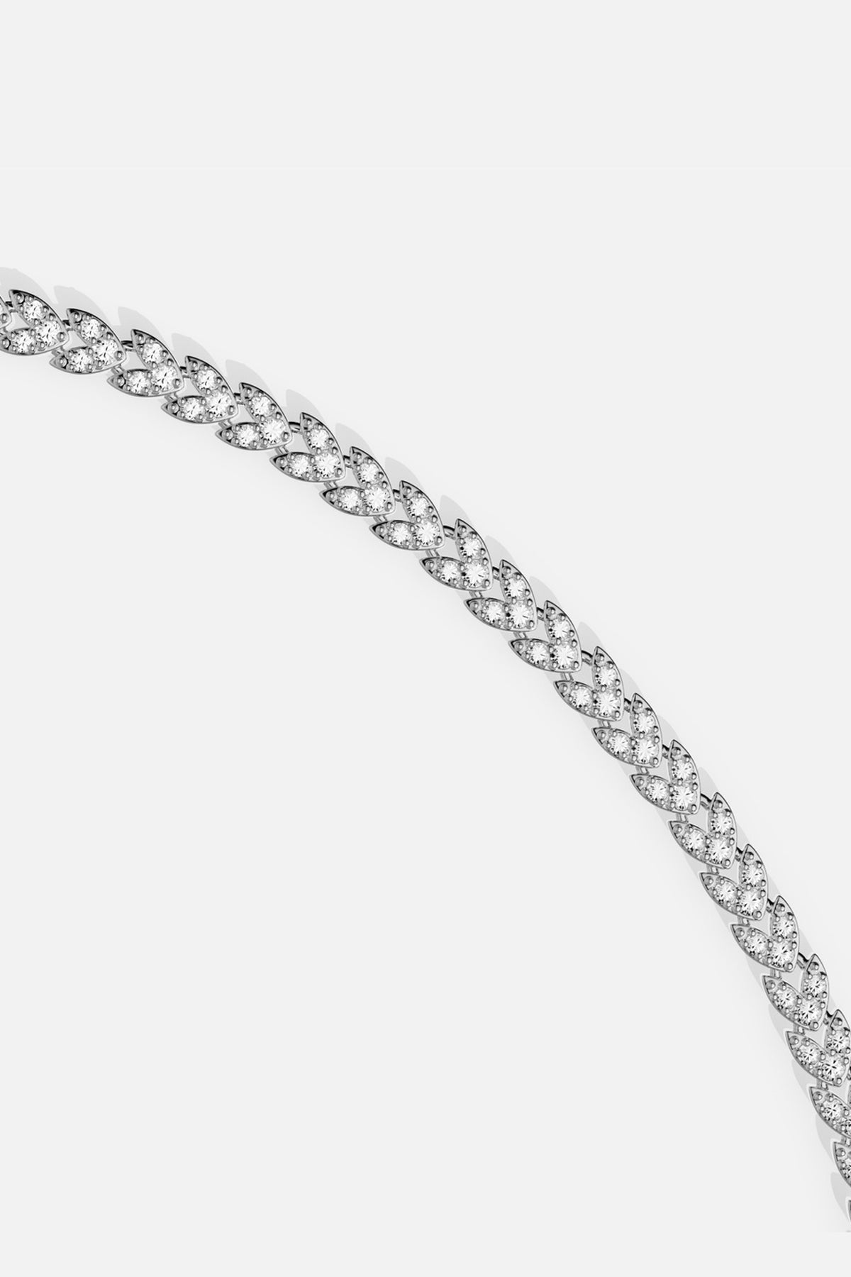 Bracelet APM, un délicat épi scintillant à la finition rhodiée.