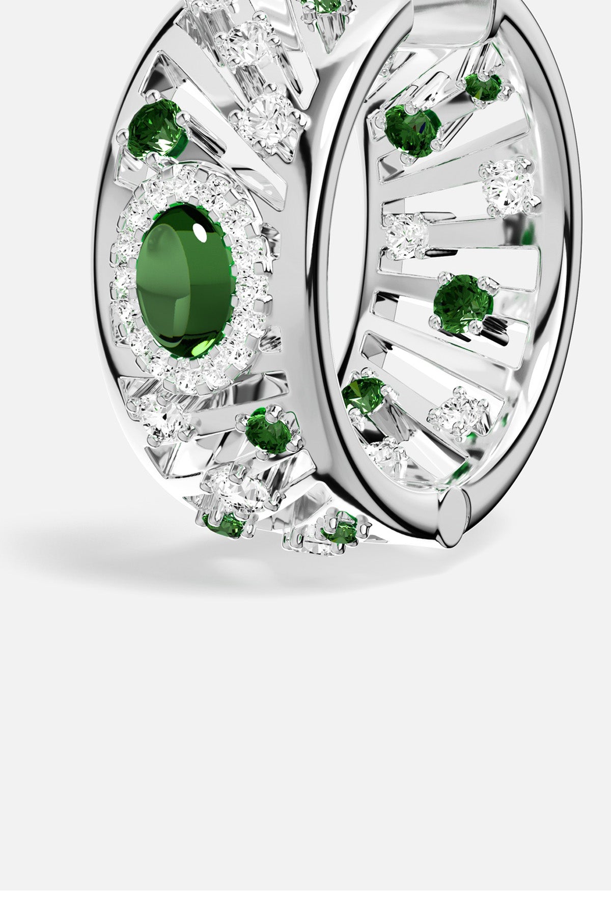 Bague APM au finish rhodium, éclats verts et blancs, éclat solaire et audacieux.