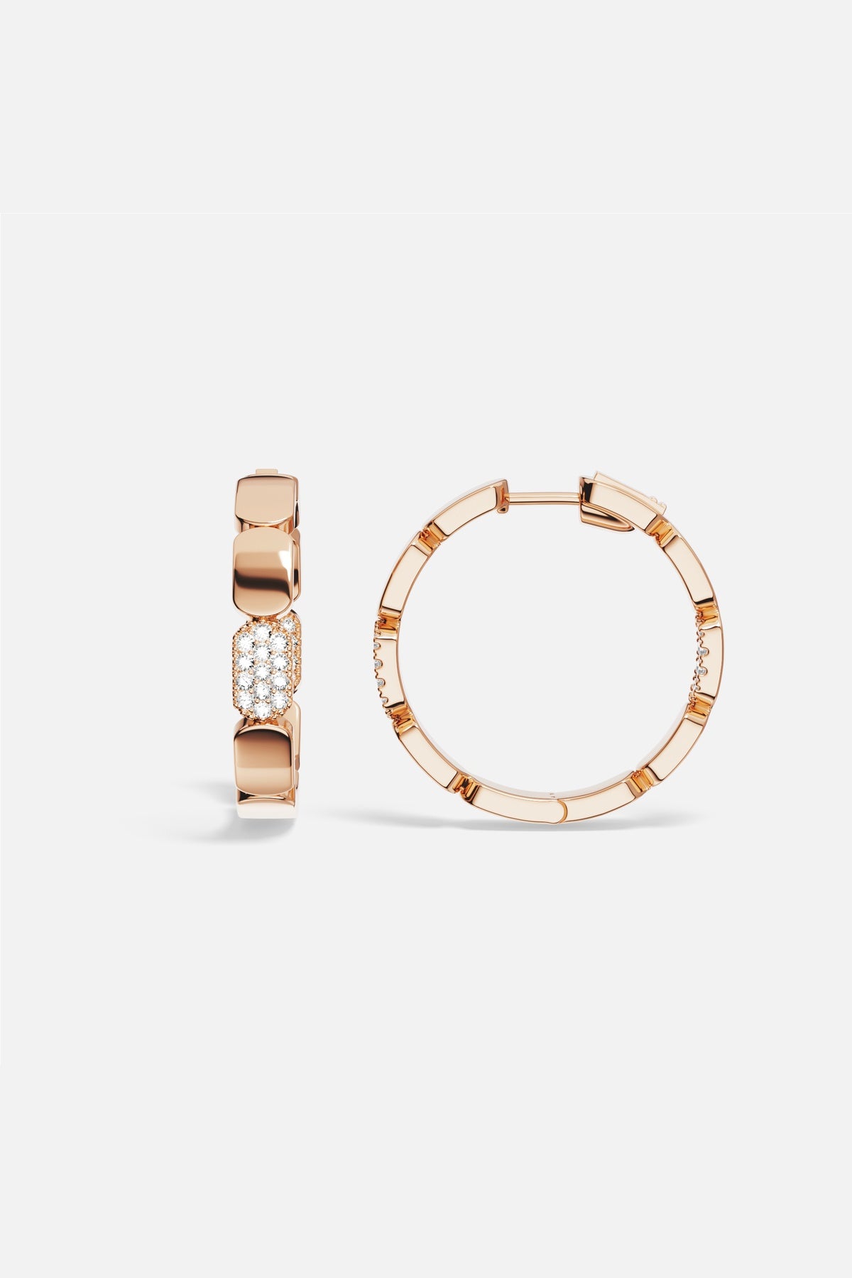 Créoles APM, éclat rosé et pavé lumineux pour une allure moderne et raffinée.