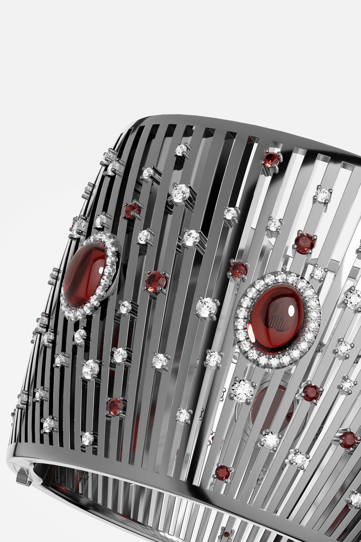 Manchette APM en finition rhodium, cabochons rouges et éclats scintillants, allure audacieuse et couture.