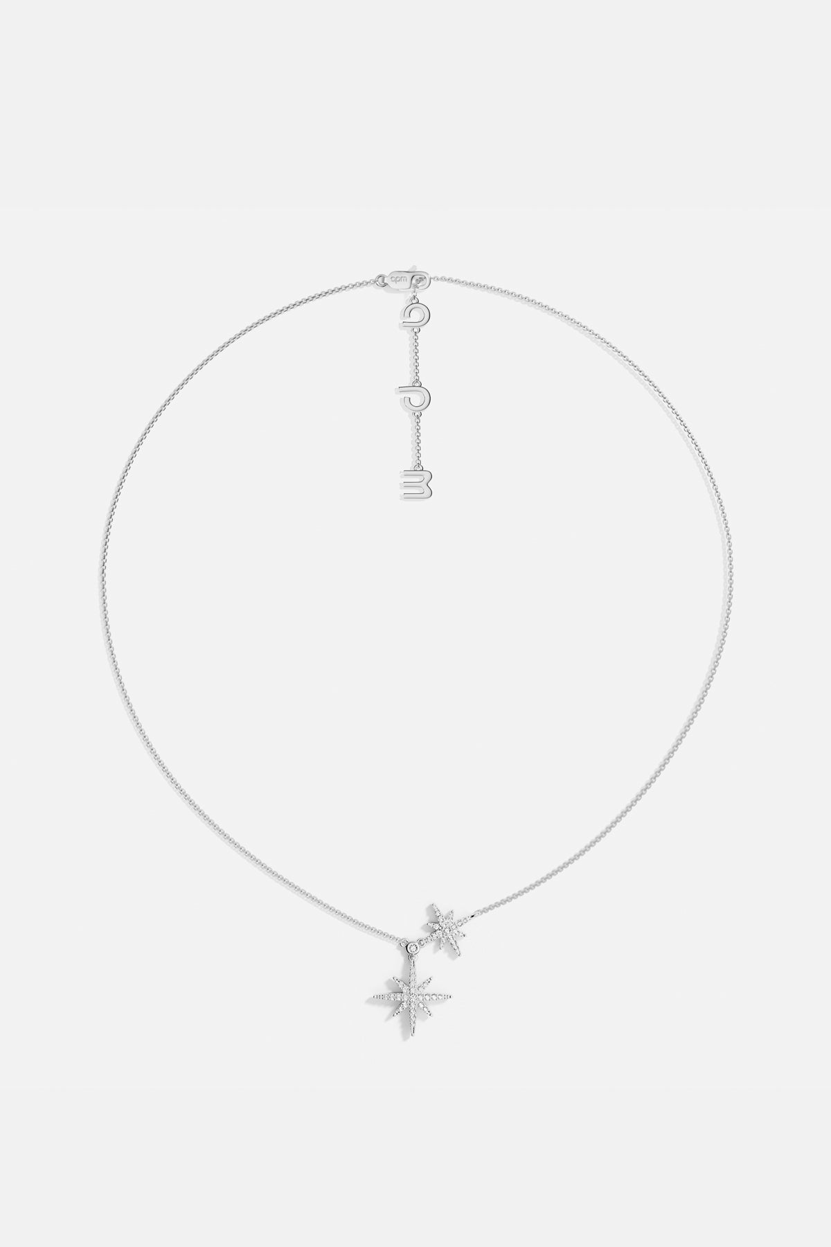 Collier APM Météorites, deux étoiles scintillantes suspendues avec grâce et modernité.