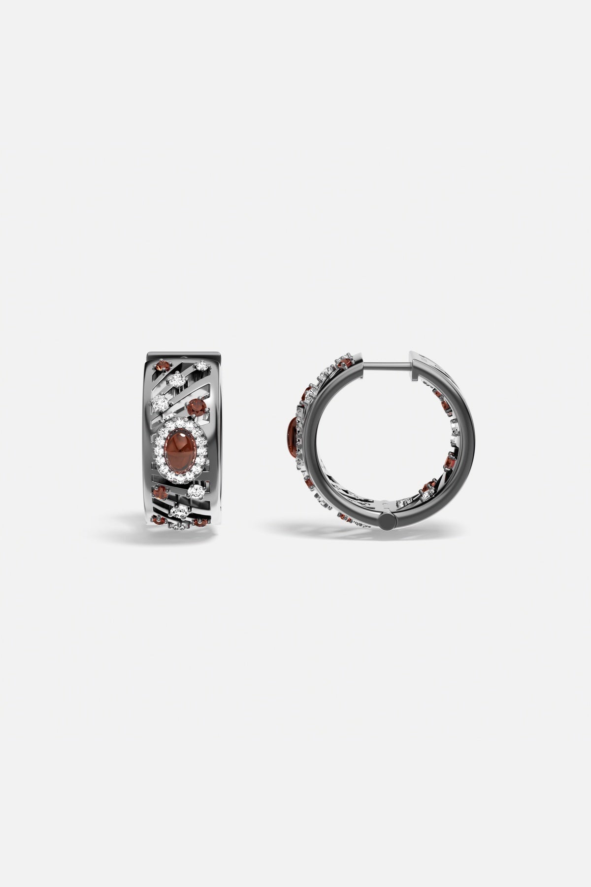 Boucles d'oreilles APM, éclats rouges et finition rhodium, une allure audacieuse et raffinée.