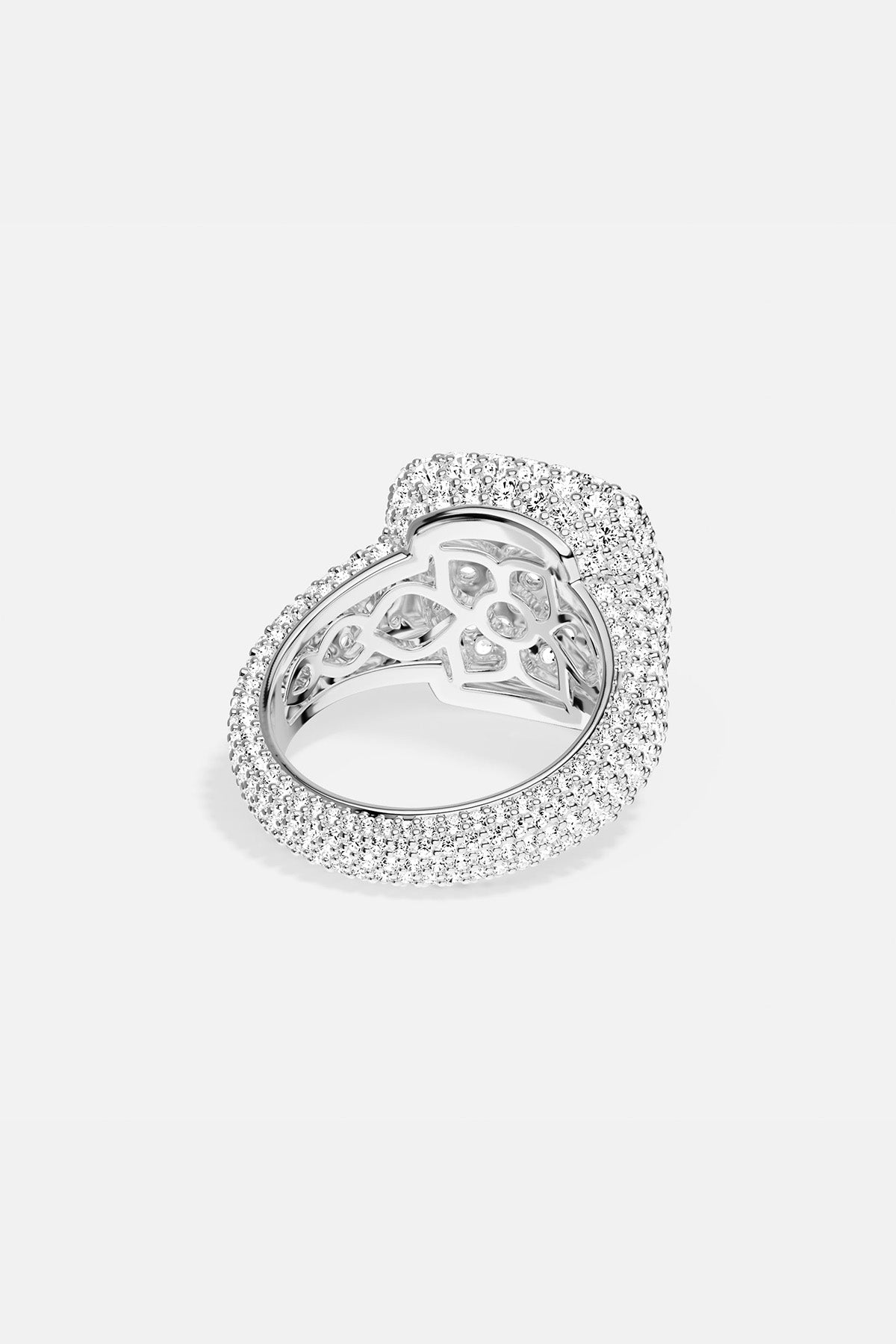 APM MONACO silver ring with embedded white stones on a light background
