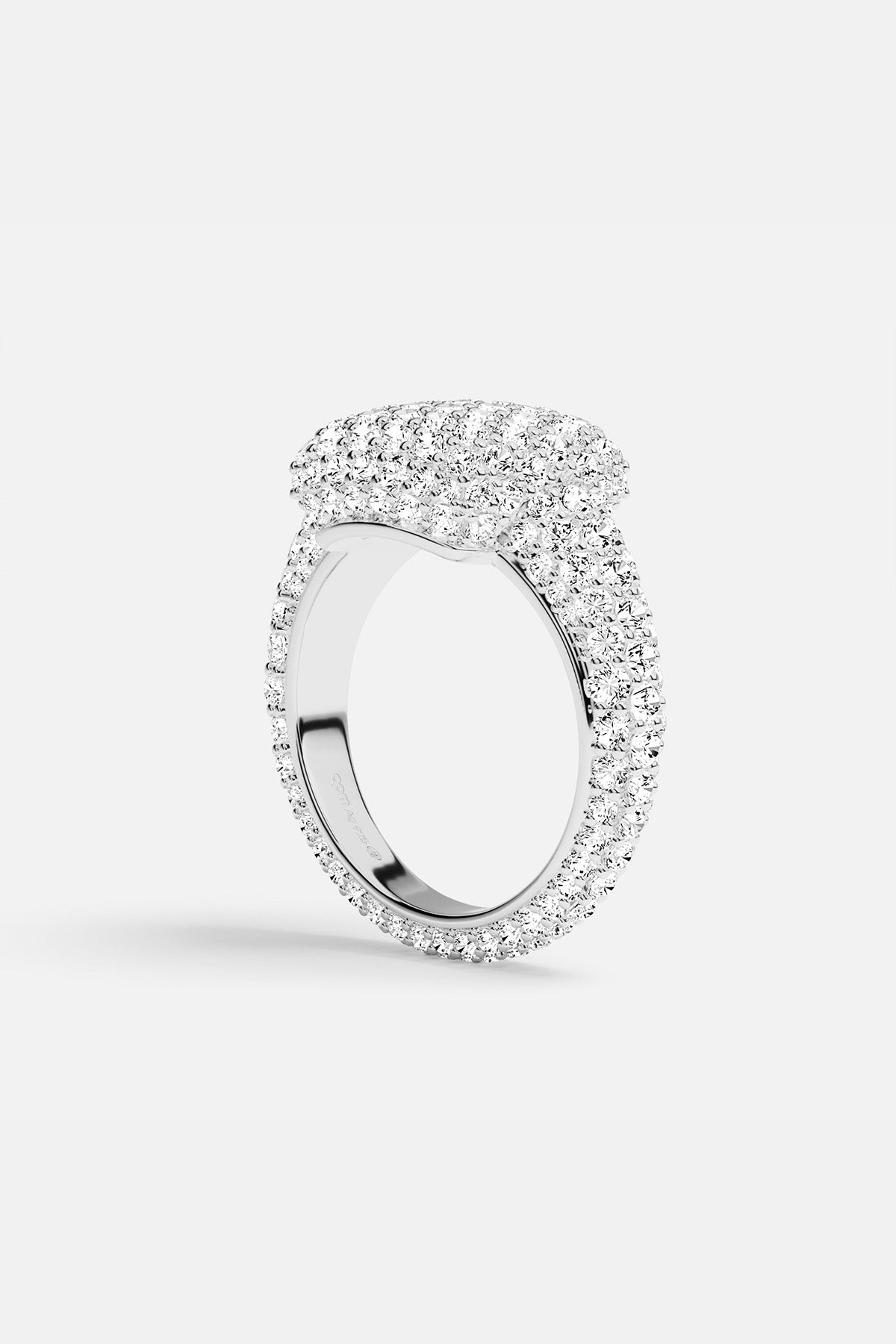 APM MONACO silver ring with clear white stones on a white background
