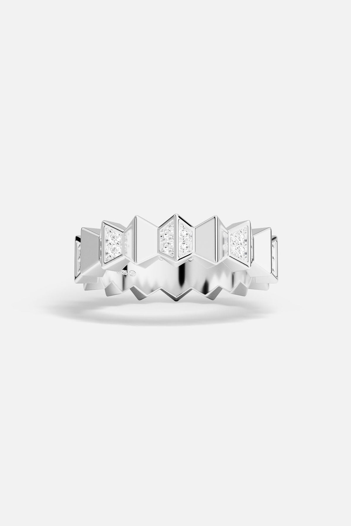 Silver ring with geometric design on a white background