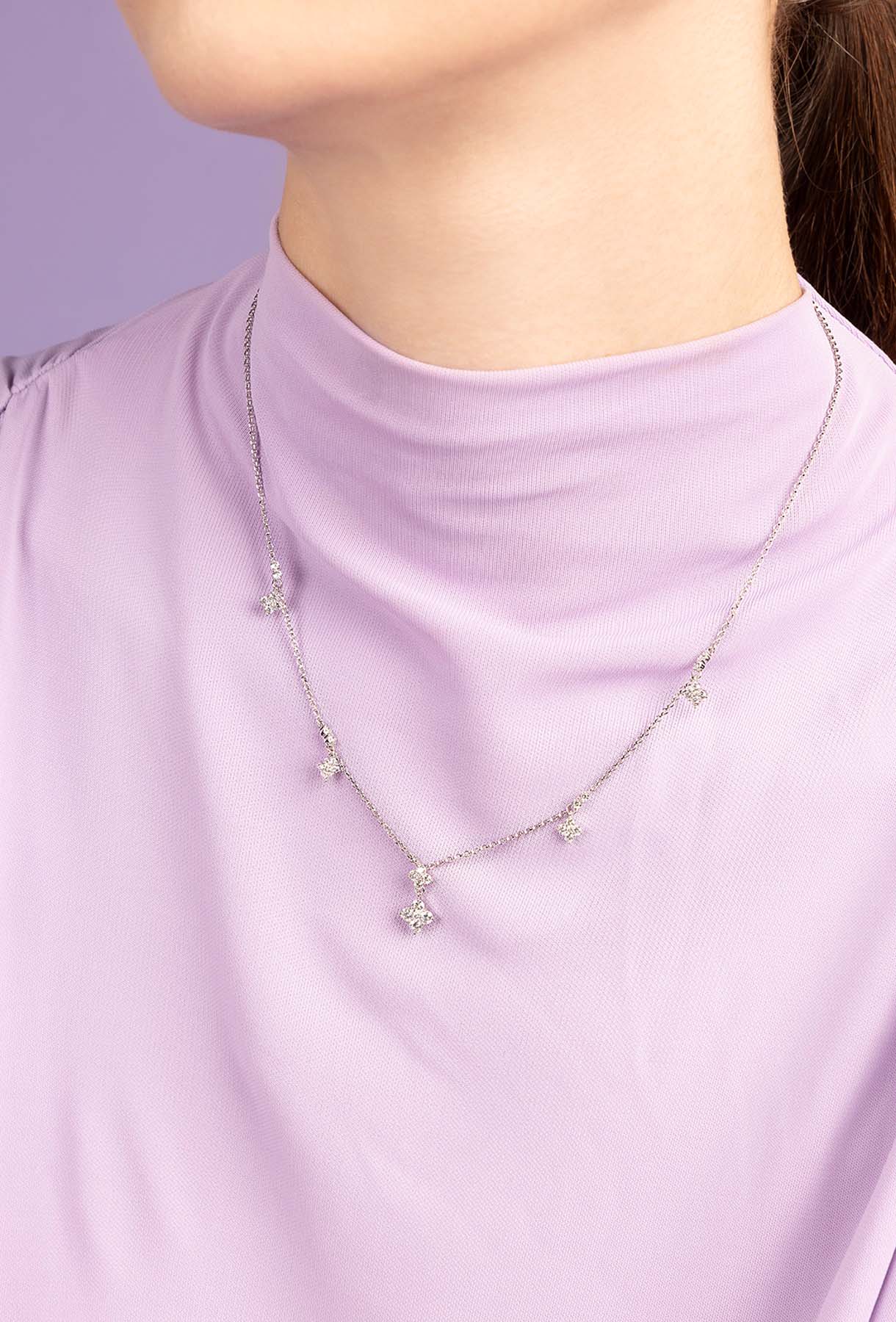 APM MONACO spark adjustable necklace in silver worn on model