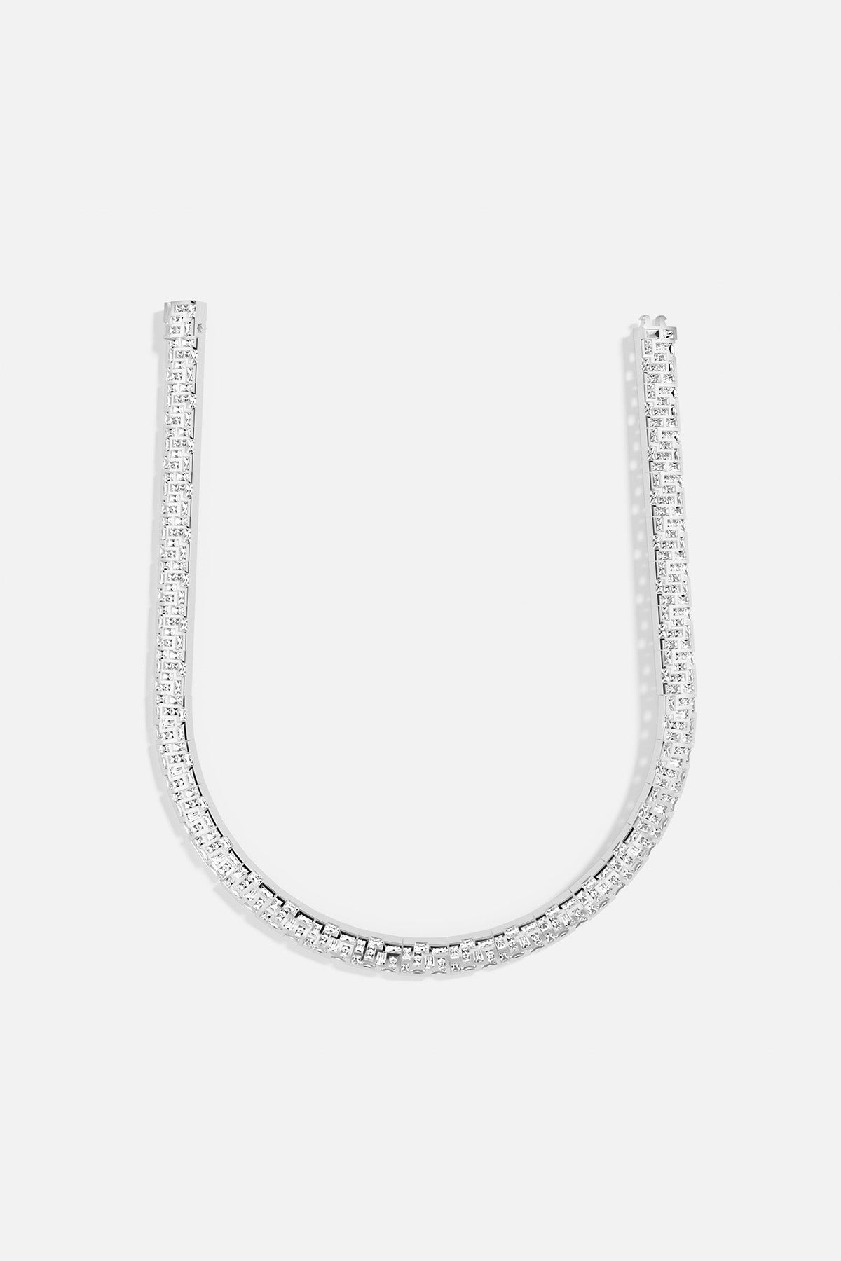 APM MONACO labyrinth necklace in silver on a white background