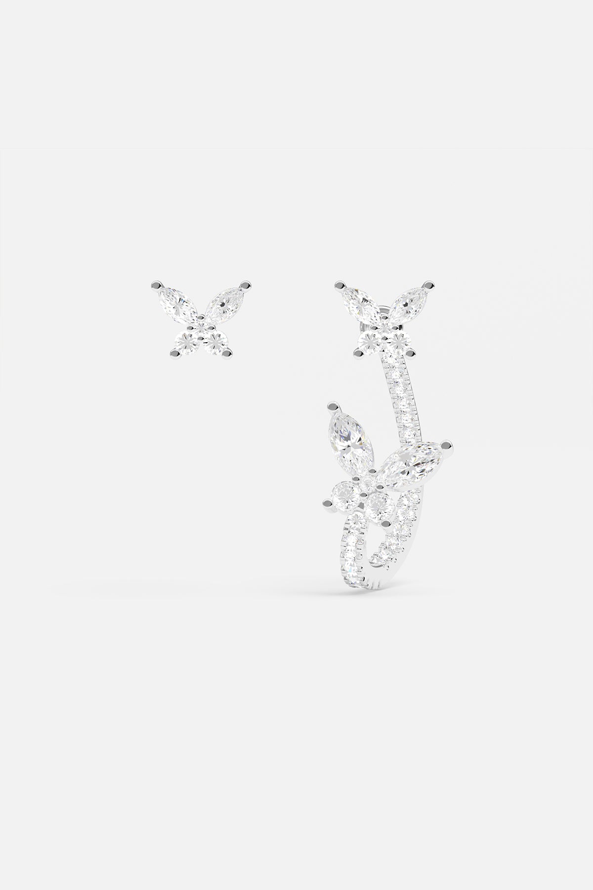 APM Monaco Boucles d'Oreilles Asymétriques Papillon en Argent