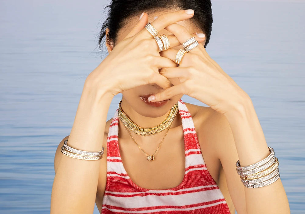 Model wearing APM Monaco Torsade Jewelry