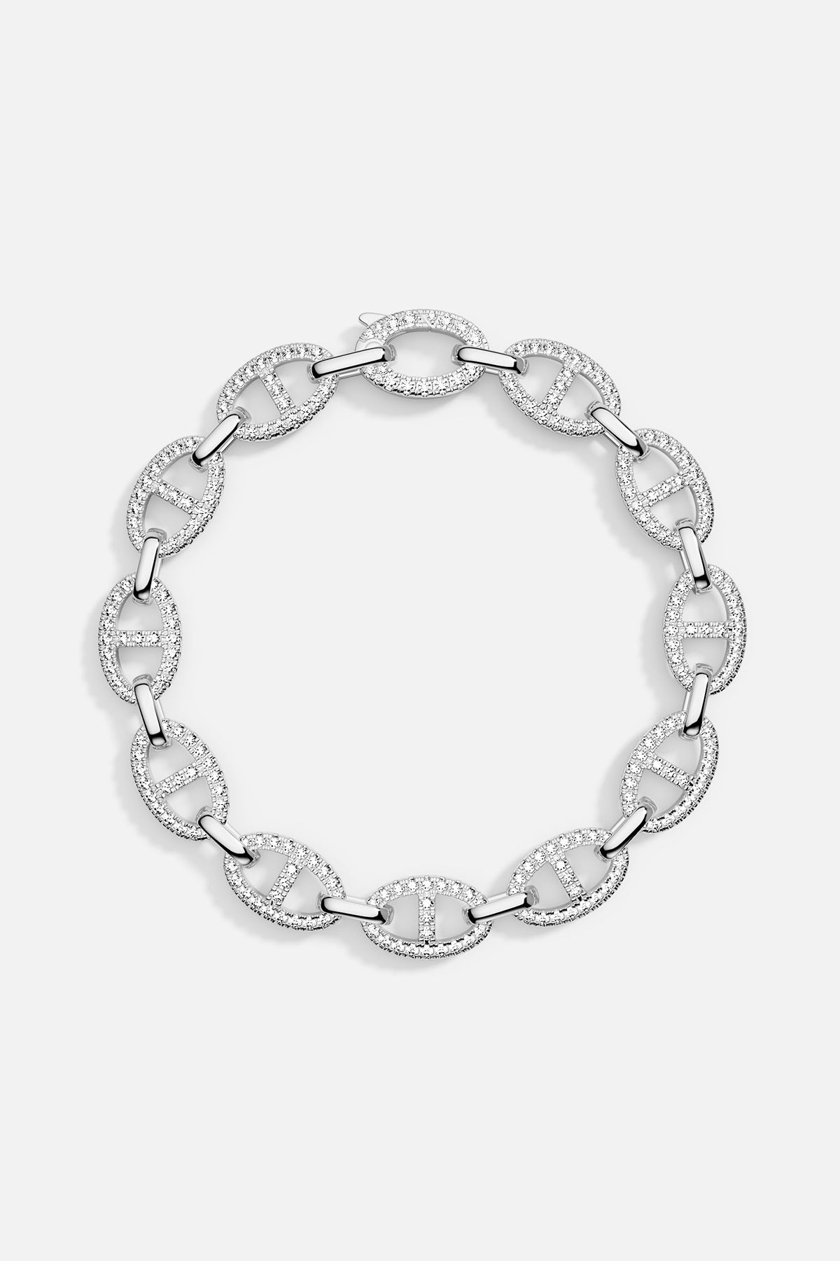 A sterling silver chain bracelet paved with white cubic zirconia, displayed in a circular arrangement to highlight the link design.