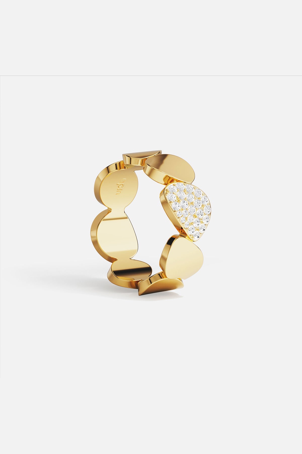 Rings APM Monaco: yellow gold ring with round and irregular segments, one segment pavé-set with white stones.